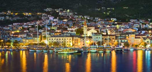 Town Makarska in Croatia at night Town Makarska in Croatia at night - travel background
