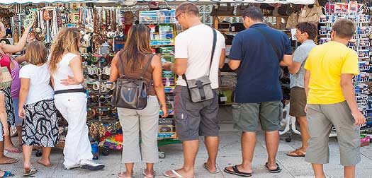 Tourists with papers and postcards on the streets
