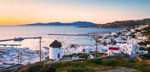 traditional windmill over the town of mykonos, greece. traditional windmill over the town of mykonos, greece.
