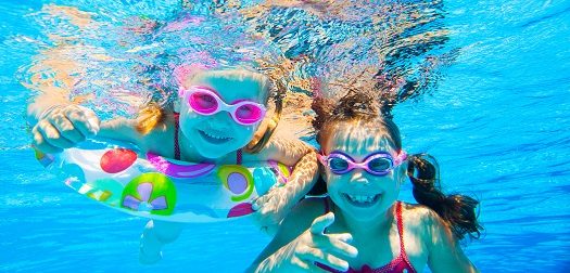 girls in swimming pool Kids in swimming pool