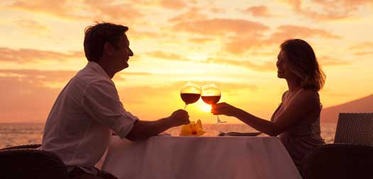Couple enjoyng diner while on all inclusive lefkas holidays